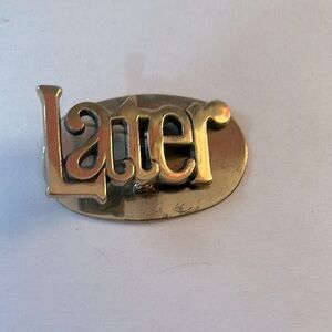 Vintage brass paperweight clip from the 1970s
